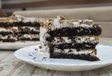 Slice of layer cake with cream filling