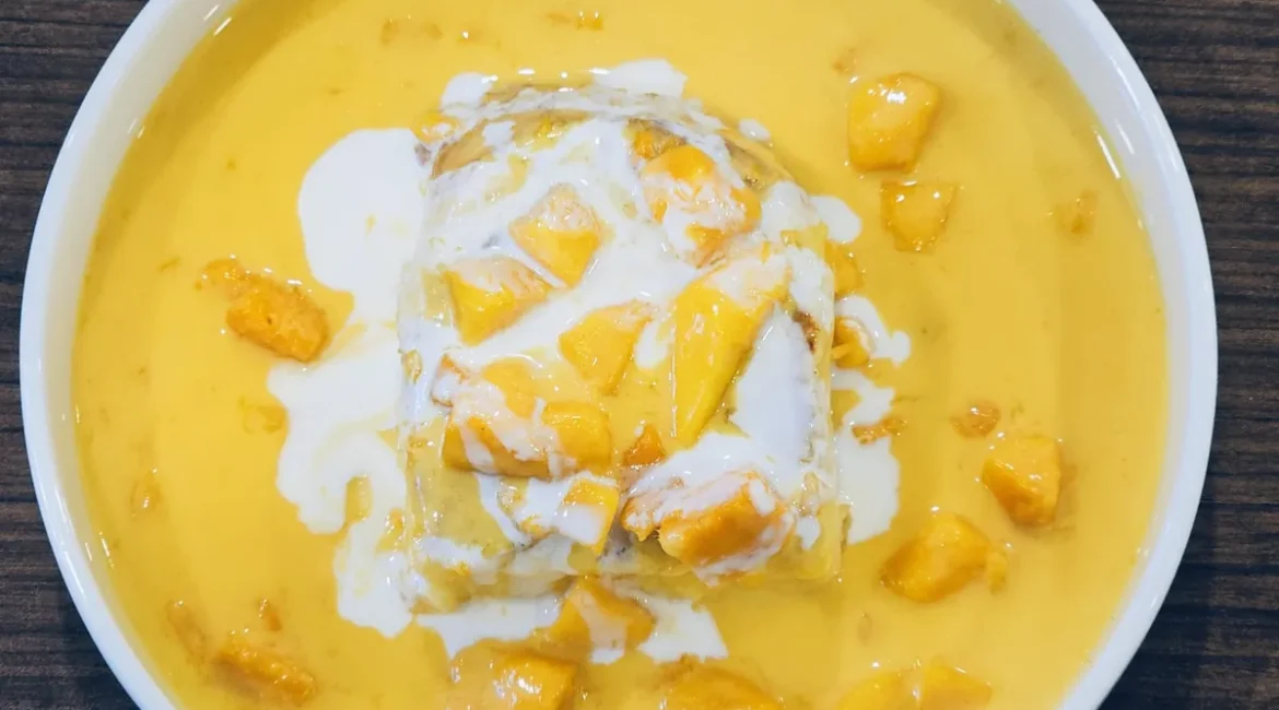 Mango dessert with cream in a bowl