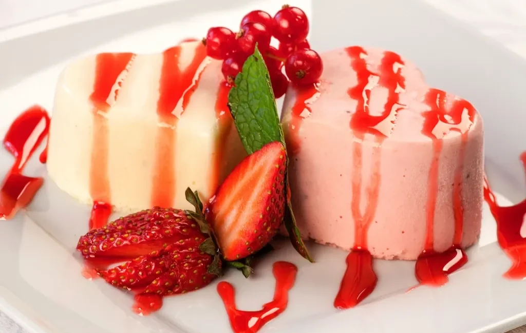 Strawberry panna cotta with berry sauce